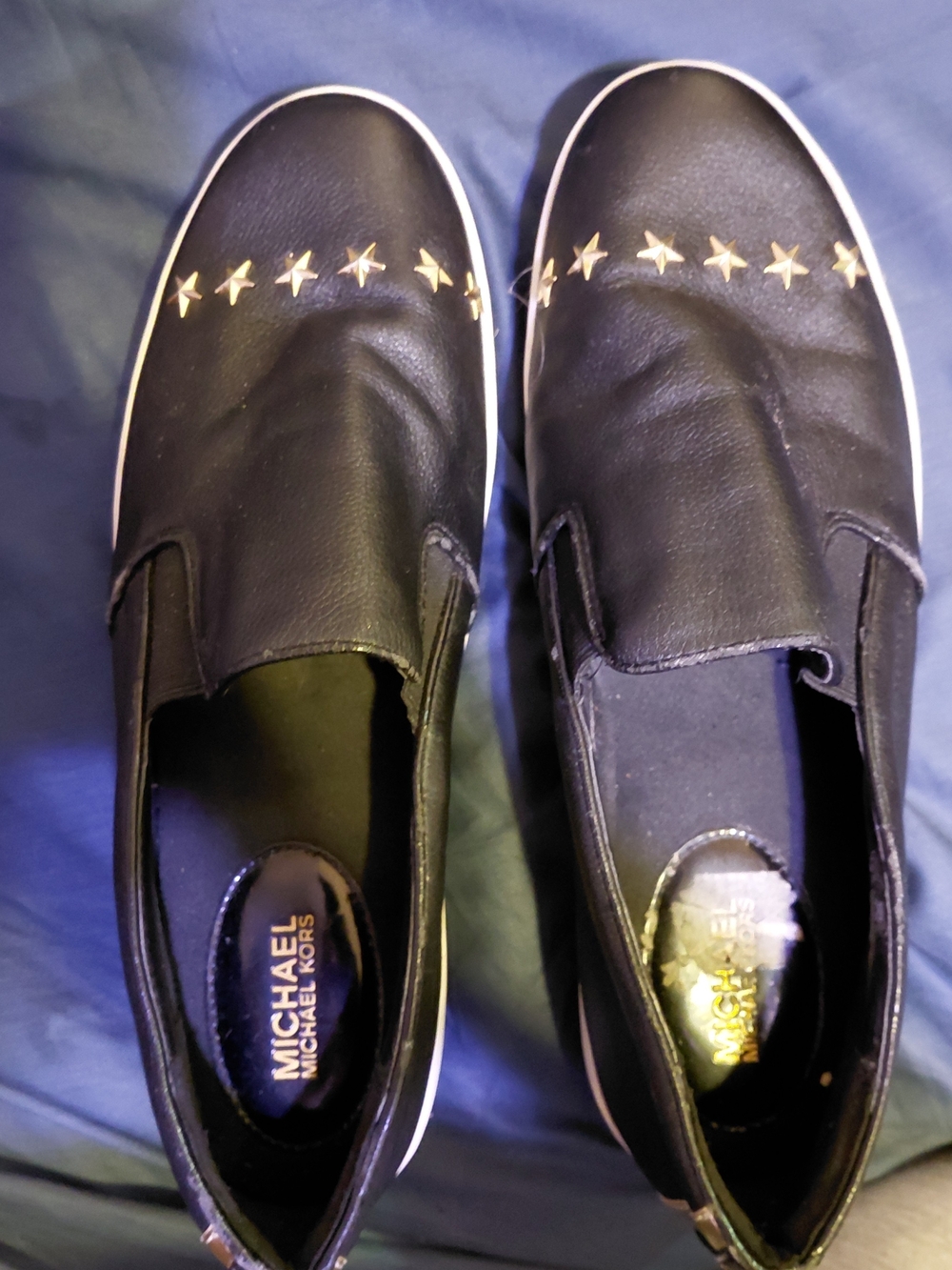 Michael Kors Men's Black Slip-On Sneakers with Gold Star Accents